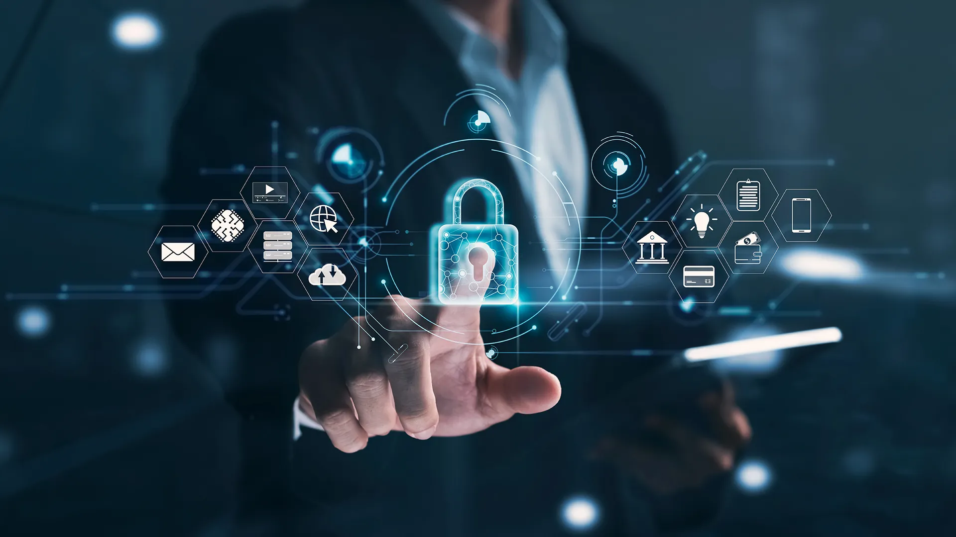 Business professional interacting with digital cybersecurity icons, including a padlock symbol, representing advanced threat detection and data protection strategies.